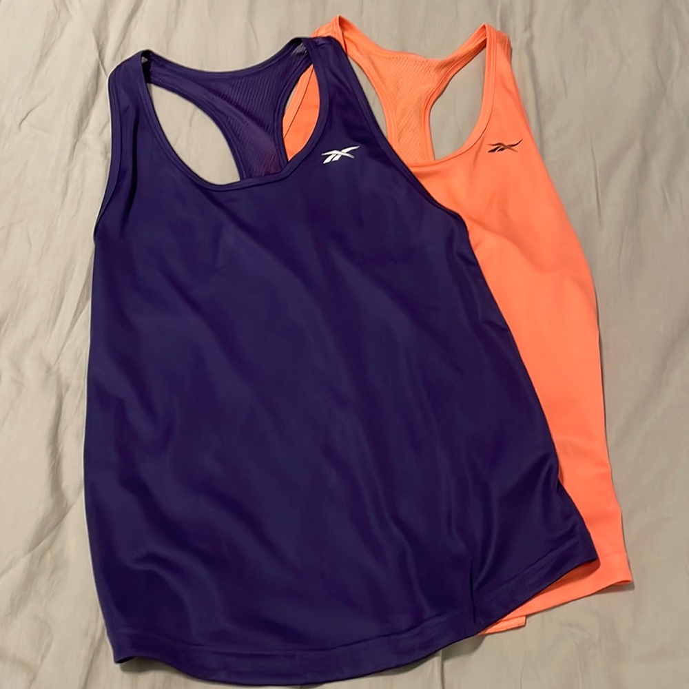 2 Reebok tanks
